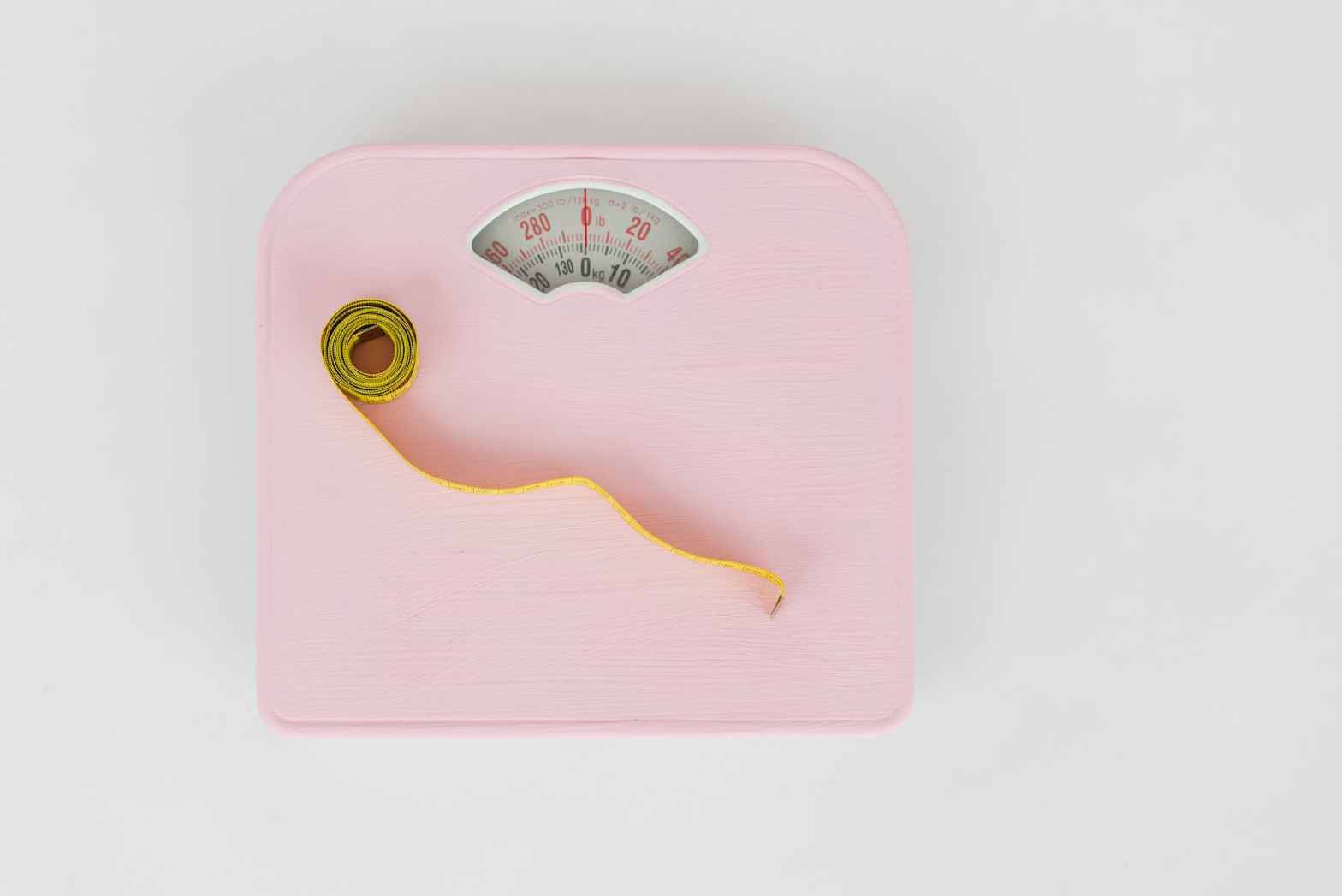 measuring tape on a weighing scale